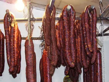 Csabai sausages hanging to dry.